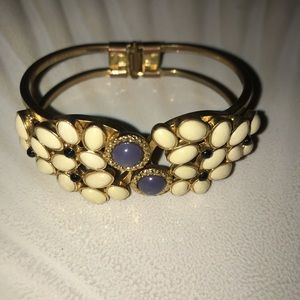 Gold cuff with detailing